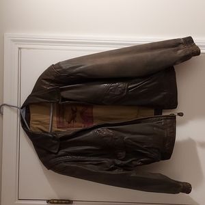 Brown leather jacket. Peter England brand.  Size lge